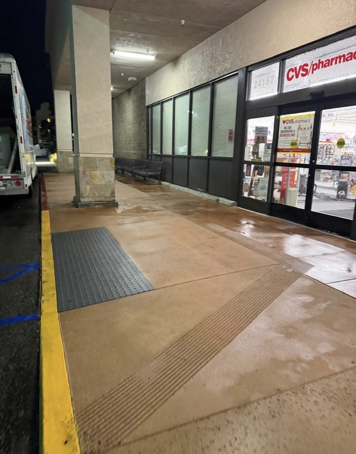Commercial sidewalk or storefront walkway cleaning