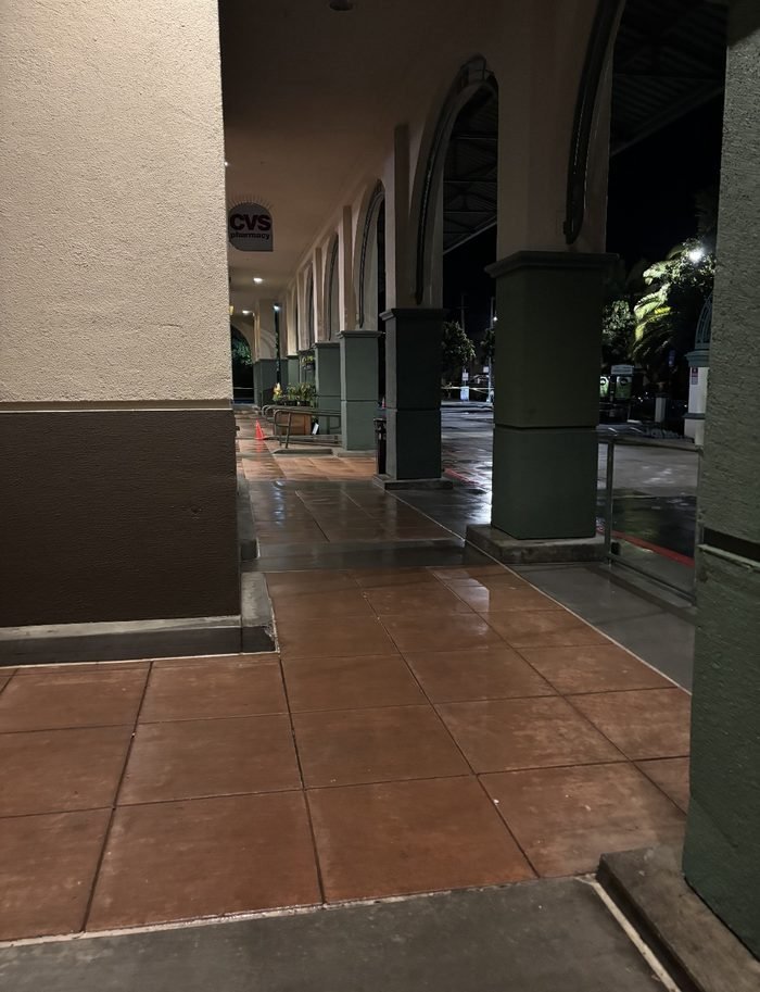 Commercial sidewalk or storefront walkway cleaning